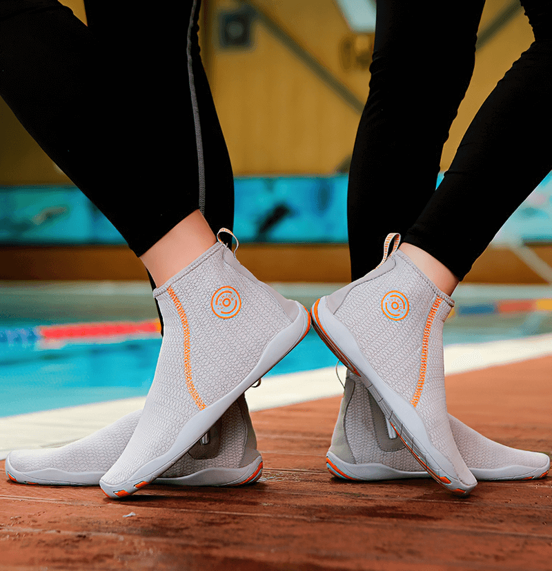 Two people by a pool wearing Zipper Breathable Water Shoes, highlighting the design and functionality for swimming and outdoor sports.